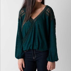 Green buckle top